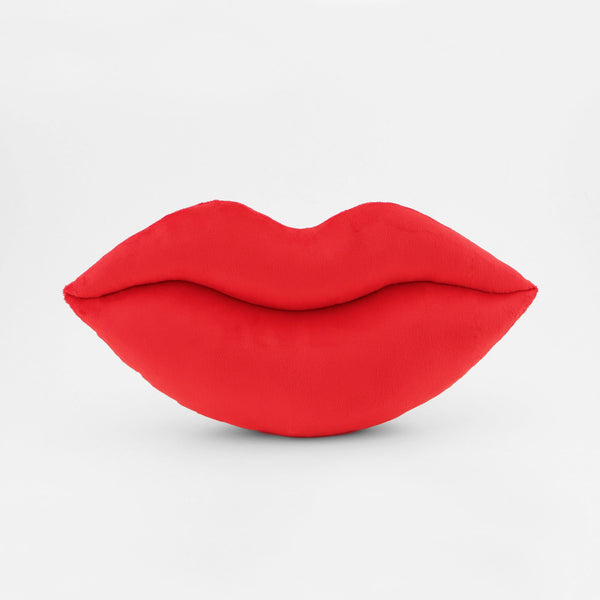 A Scarlet Red lips shaped decorative throw pillow.