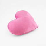 Side view of a Bubble Gum Pink plush heart shaped decorative throw pillow.