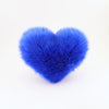 Front view of a Cobalt Blue faux fur heart shaped decorative pillow.