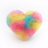 Fluffy Rainbow colored heart shaped decorative pillow.