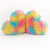 A pair of Fluffy Rainbow colored heart shaped decorative pillows.