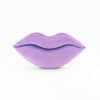 A Lavender lips shaped decorative throw pillow.