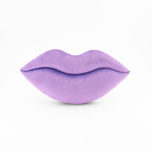 A Lavender lips shaped decorative throw pillow.