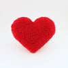 Front view of a Scarlet Red Curly Shag plush heart shaped decorative pillow.