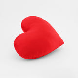 Side view of a Scarlet Red plush heart shaped decorative throw pillow.