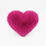 Magenta Heart shaped decorative pillow in fluffy shag material.