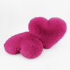 A pair of Magenta Heart shaped decorative pillows in fluffy shag material.