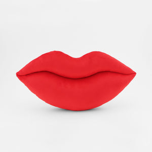 A Scarlet Red lips shaped decorative throw pillow.